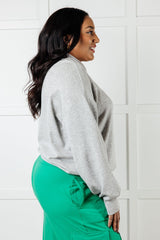 Chaqueta Rogue Runner con media cremallera en gris jaspeado