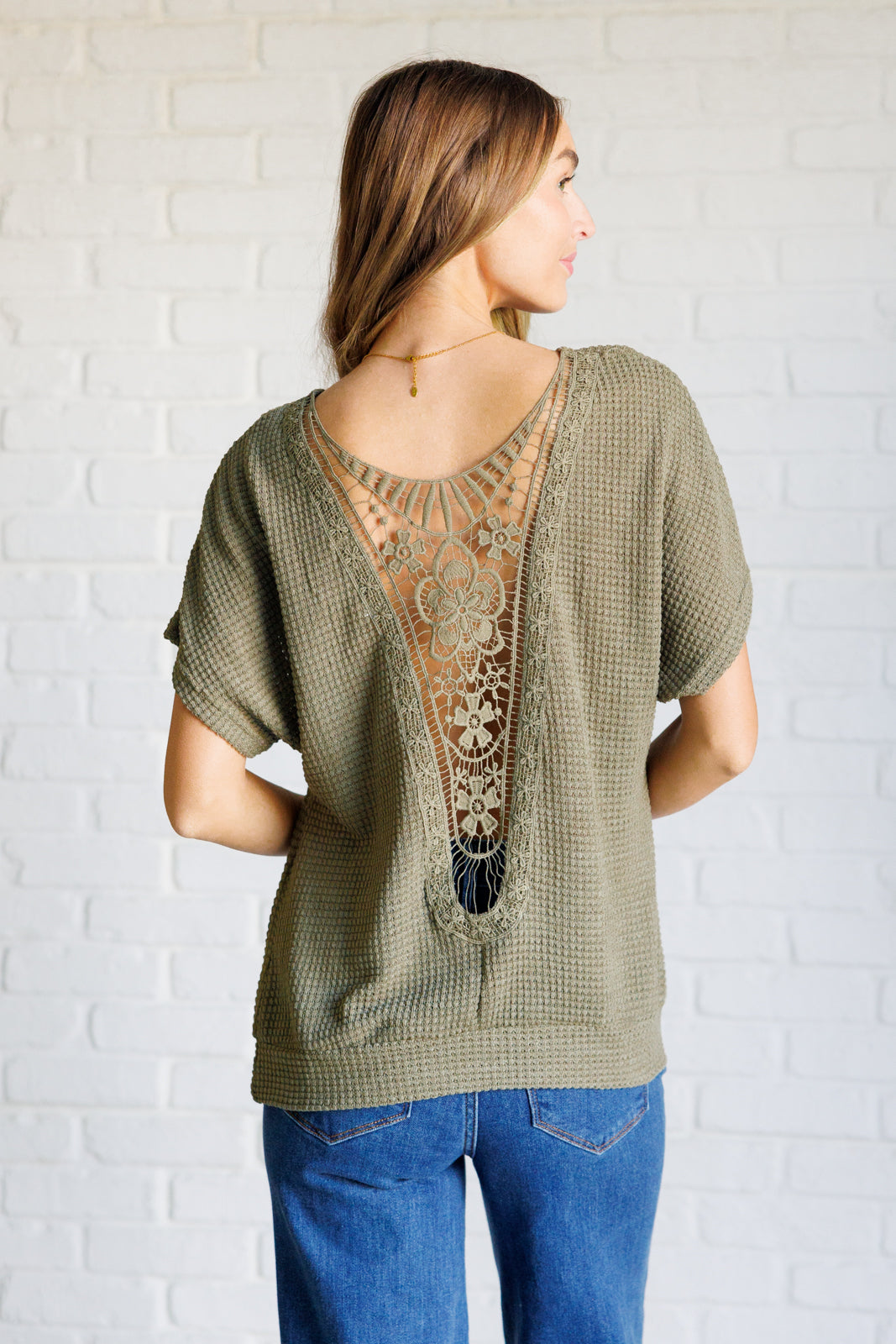 Top con espalda de encaje y detalle secreto