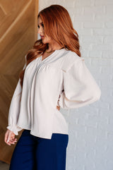 Ella debería entender la blusa con mangas globo