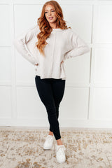 Suéter Hacci de silueta sencilla y cepillado en beige arena