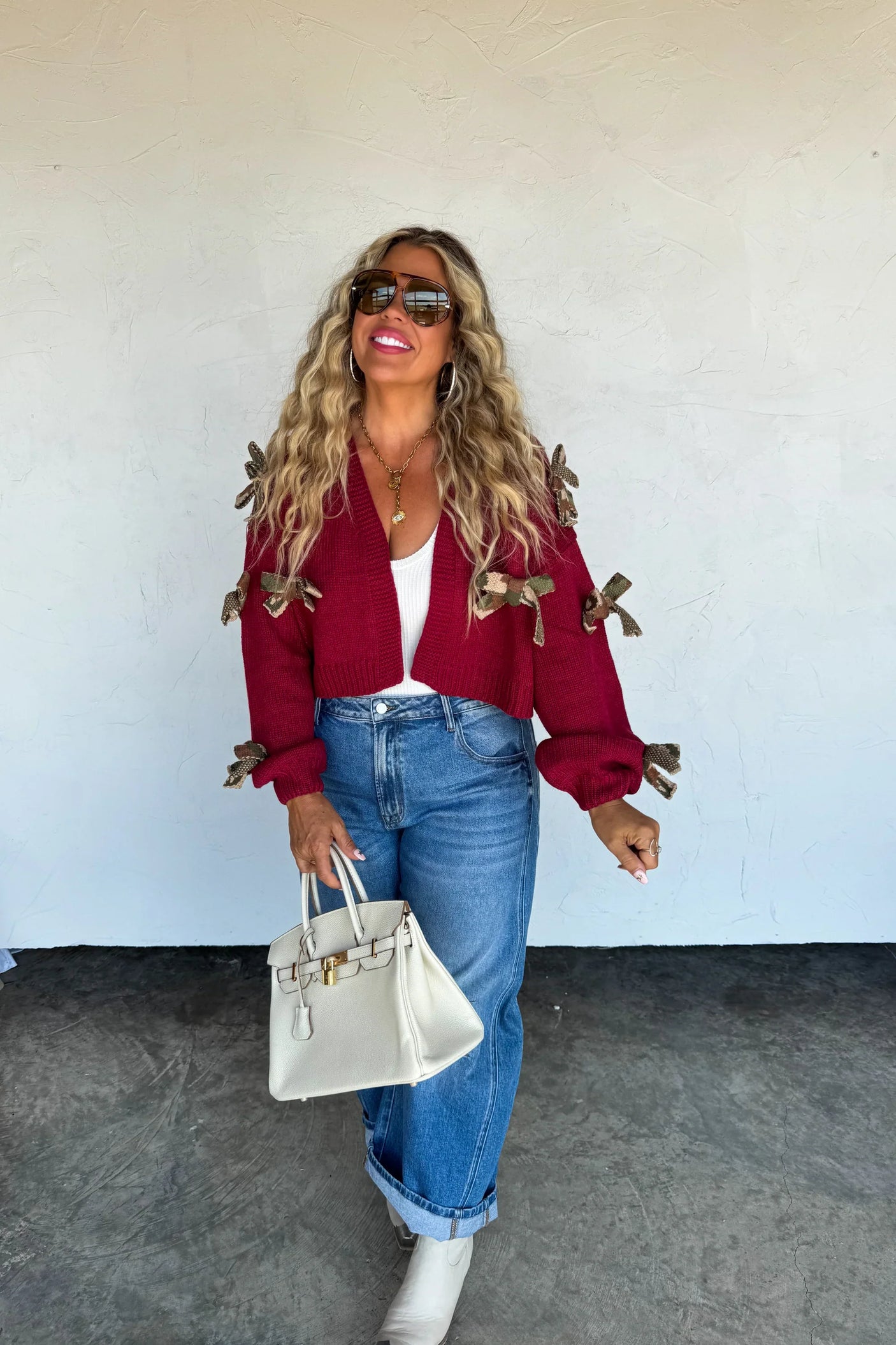 RESERVA: Cárdigan de punto con lazo Sloane