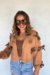 RESERVA: Cárdigan de punto con lazo Sloane