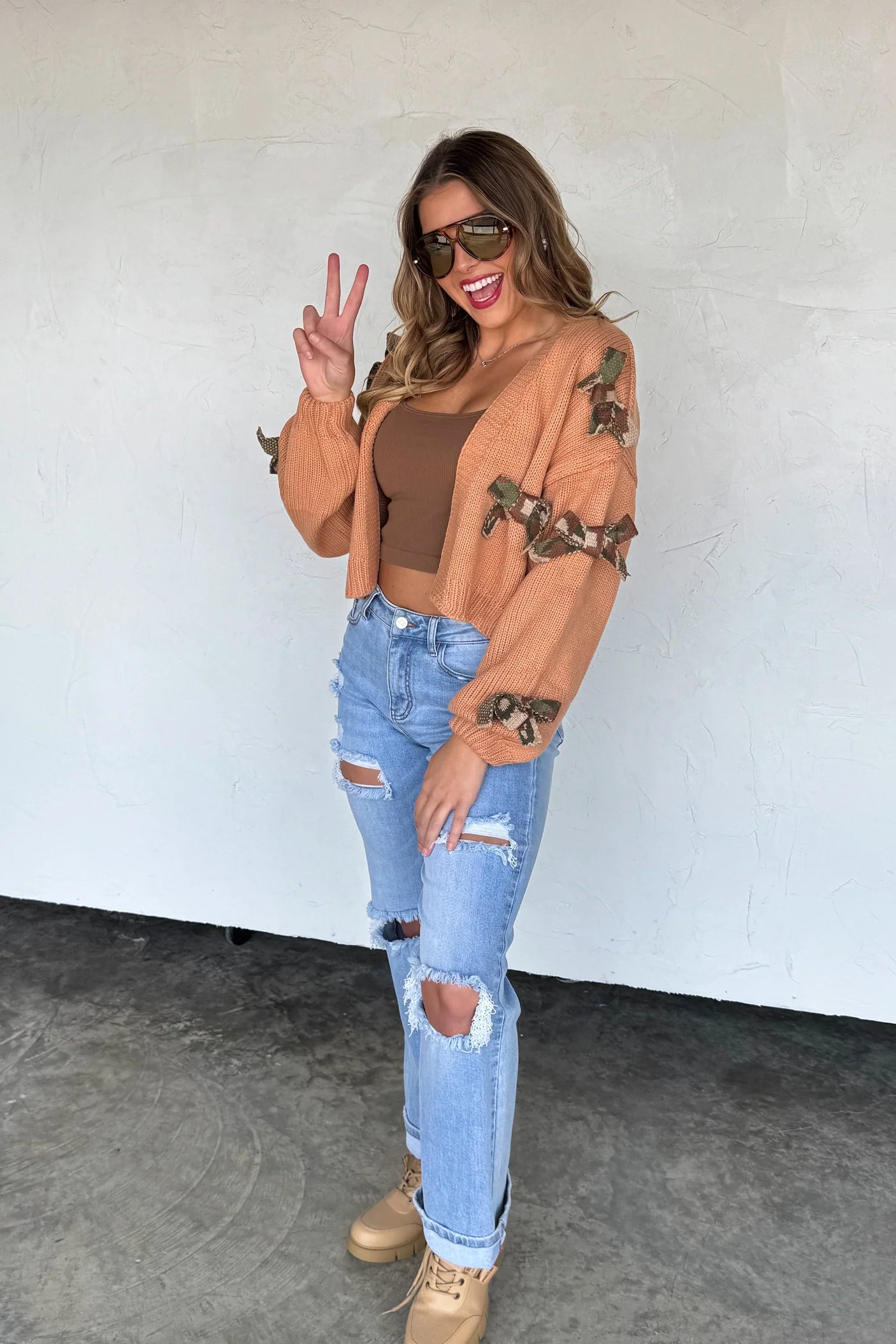 RESERVA: Cárdigan de punto con lazo Sloane