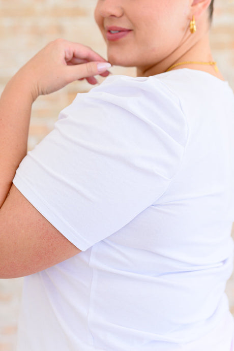 Camiseta blanca con mangas abullonadas Strong Enough