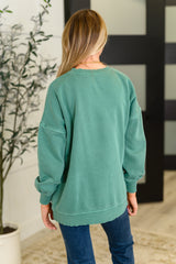 Jersey Talk Cozy to Me con dobladillo escalonado en verde oscuro
