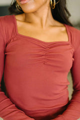 The Girls are Back in Town Long Sleeve Top in Burgundy