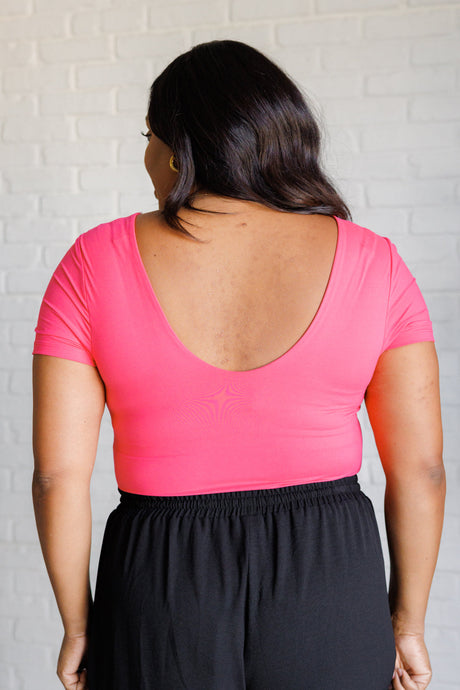 Body de cuello cuadrado "No son como nosotros" en rosa flamenco