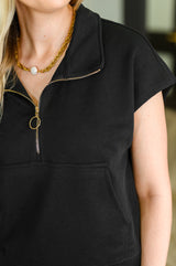 Conjunto de top y pantalones cortos con media cremallera de veinticuatro quilates