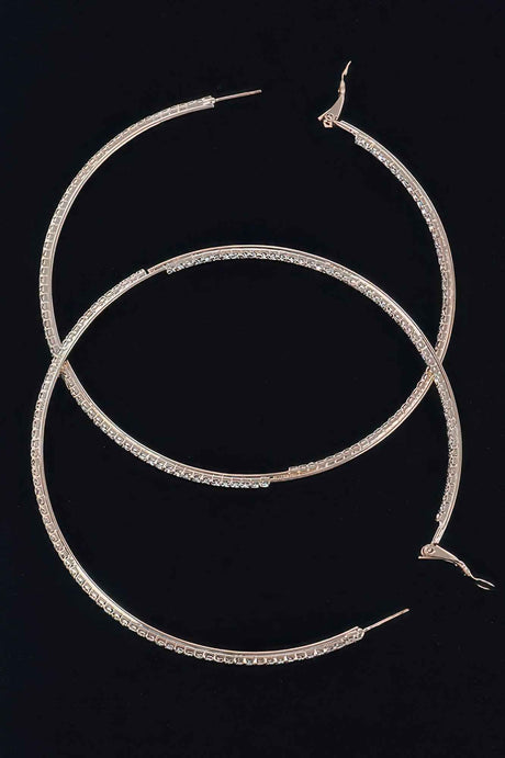 Thin Hoop Earrings With Rhinestone Details.