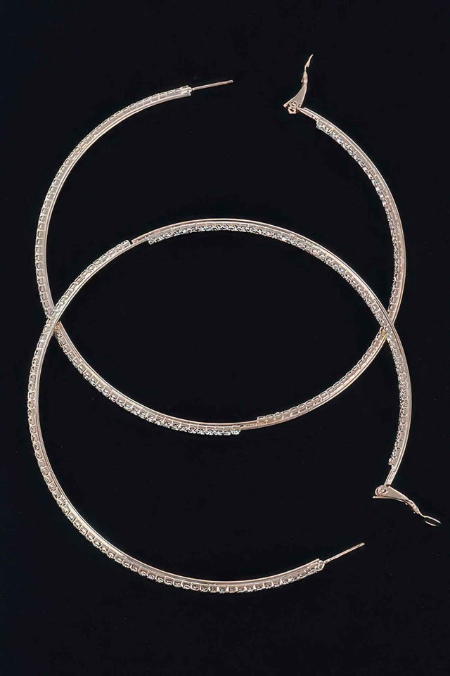 Thin Hoop Earrings With Rhinestone Details.