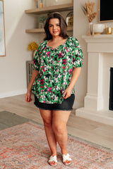 Top floral salvaje y brillante