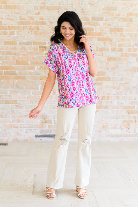 Top con cuello en V Yours Truly en color magenta